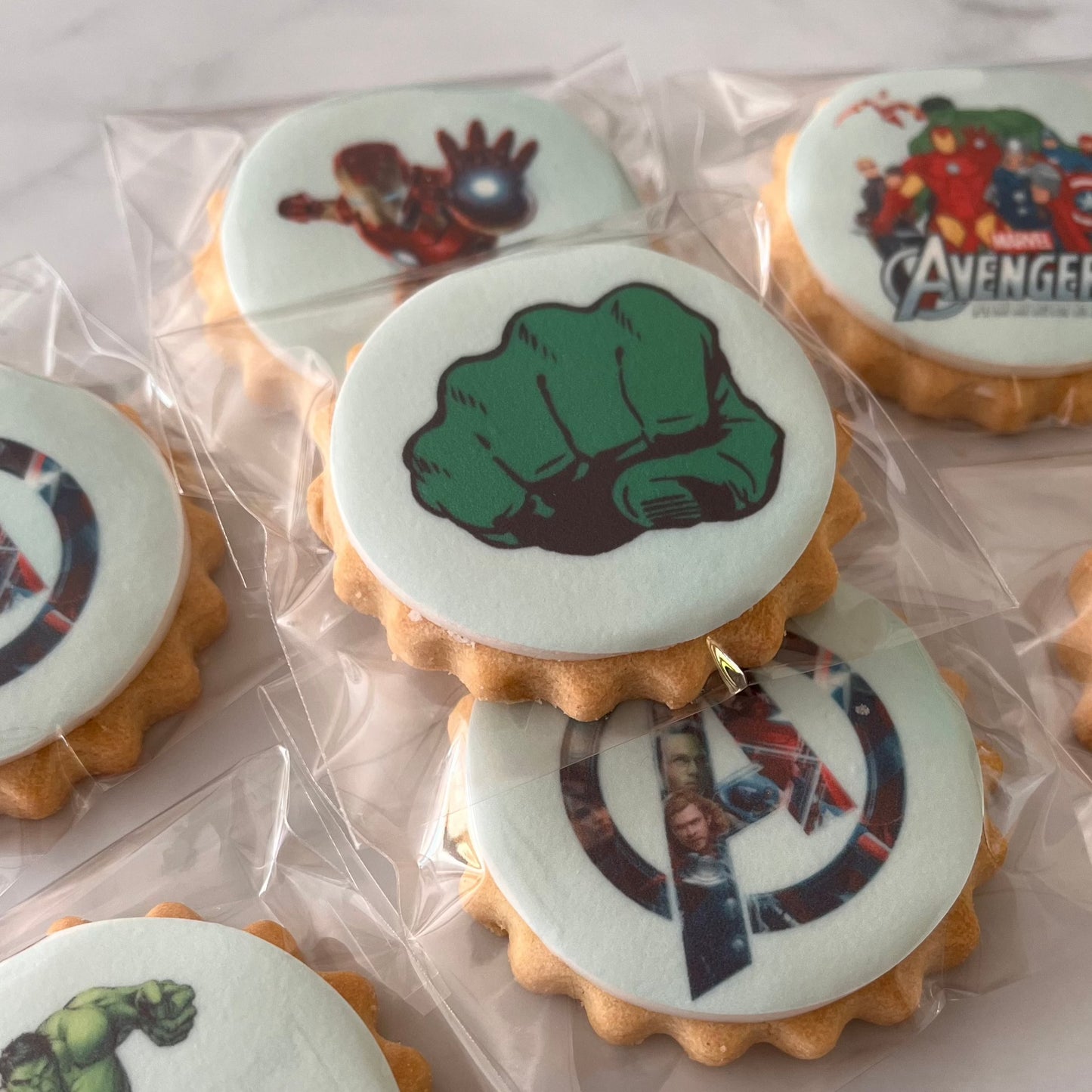Avengers Assemble themed party biscuits! These delicious treats feature beloved characters such as Hulk, Iron Man, Thor, Spider-Man and more!
