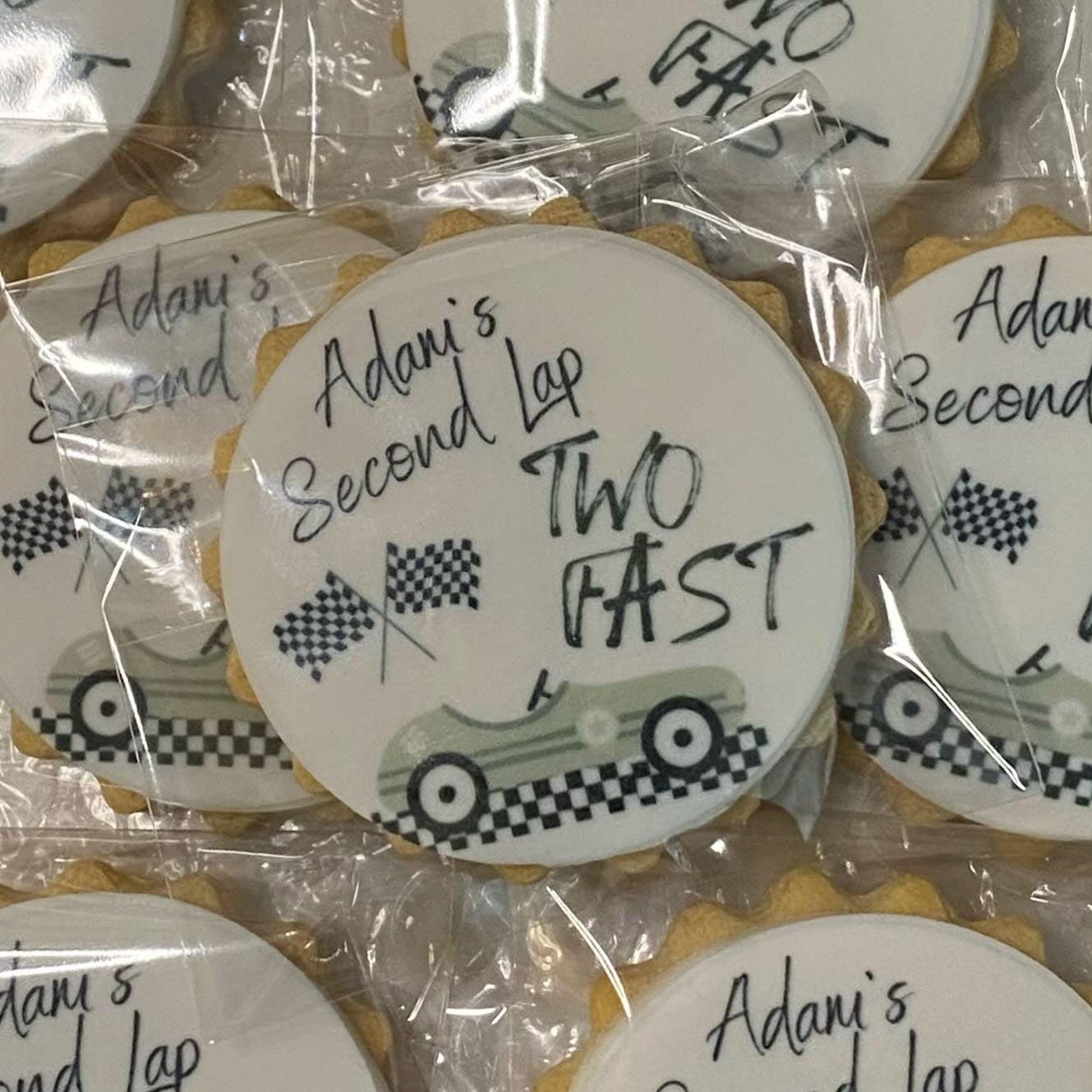 Fast-themed biscuits for birthday party, Racing car biscuits, racing car cookies, "Kids enjoying car-shaped cookies, Homemade speed-themed biscuits, racing biscuits for kids party